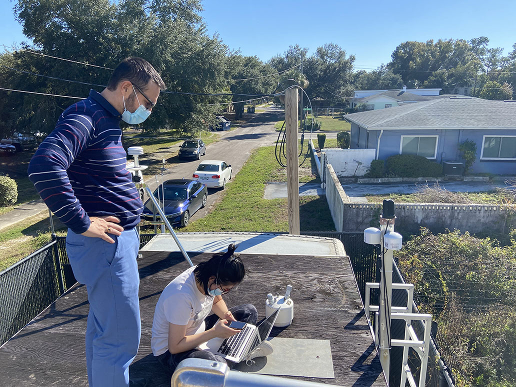 USF Researchers installing PurpleAir Monitors at the Hillsborough County EPC Munro Street Air Monitoring Site.