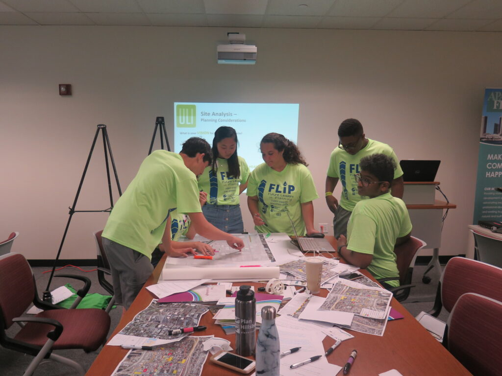Group of diverse flip students work together on a project