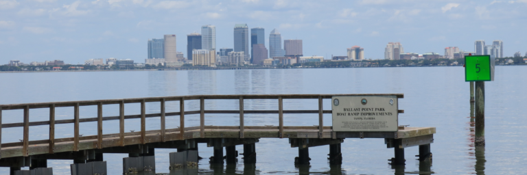 Ballast Point Park pier with the City of Tampa downtown skyline over the Hillsborough River