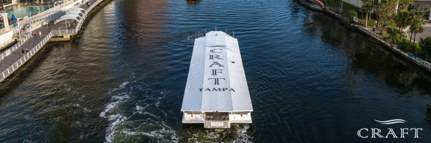 Craft Tampa watercraft floating down Hillsborough River